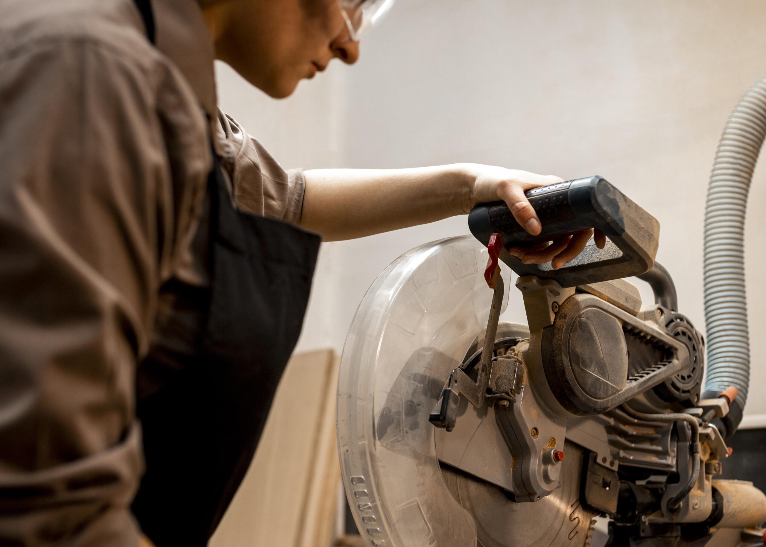 A worker installs a dryer vent