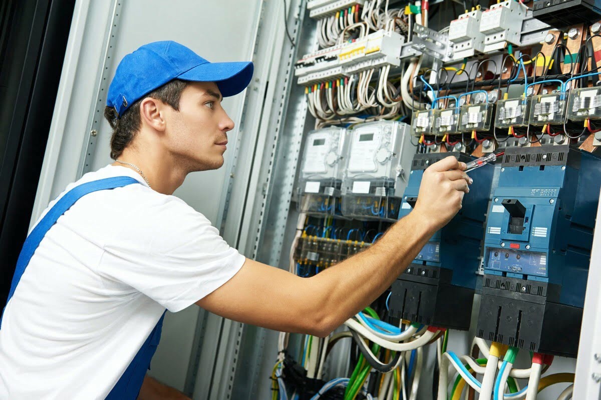 An electrical worker does his job.
