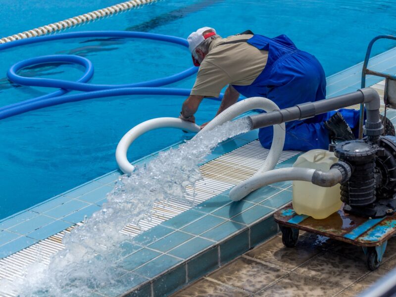 A worker prepares the pool