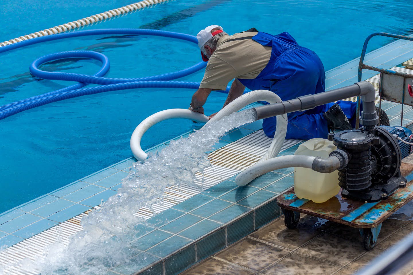 A worker prepares the pool
