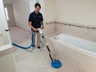A worker cleans tiles