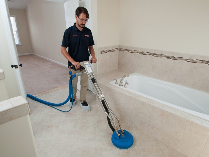 A worker cleans tiles