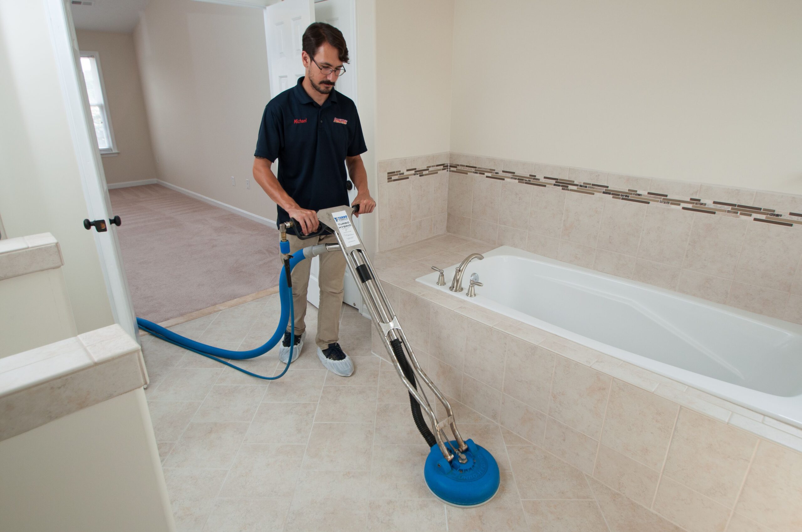 A worker cleans tiles